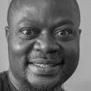 Major Assé als JB, l'ami camerounais