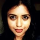 Nandini Sree als TV News reader