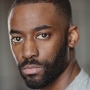 Ashley Thomas als Calvin