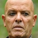 Steven Grives als Armageddon Announcer
