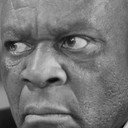 Patrick Ndlovu als Bra Pat