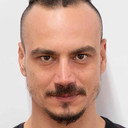Ulaş Akşit als Police Officer