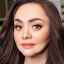 Angelika dela Cruz als Madam Evangeline "Eva" Flores