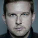 Greg McHugh als Malcolm