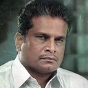 Hareesh Peradi als Karumayi