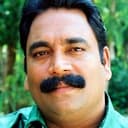 Vijayan Karanthoor als Raviettan