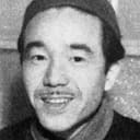 Yoshirō Katō als Radio Shop Clerk
