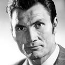 Jack Palance als Rudi Cox