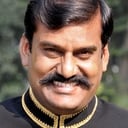 Napoleon als Dr. Harish Chandra Prasad