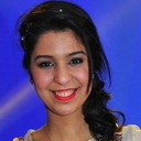 Sarah Mouhamou als Self - Host