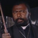 Chico Lourant als Black Pastor