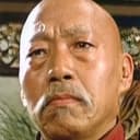 Yuen Siu-Tien als Jade Faced Tiger's Man
