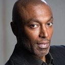 Conrad Coates als Ryan