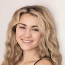 Kayden Bryce als Carol (Segment "Bloodfire Of The Satanic Warlock Ritual")
