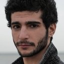 Roger Azar als Adam