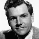 Kenneth More als Jonathan Tibbs