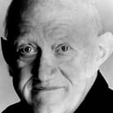 Nicholas Smith als Mr. Cuthbert Rumbold