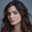 Eva Arias als Chica Bar Olivia