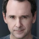 Brian J. Carter als Ernie