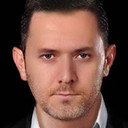 Alkan Demirlek als Mr. Demir