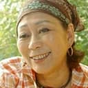 Bonnie Wong als Datuk's wife