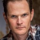Simon Vincent als David Mitchell