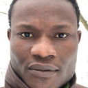 Urbain Guiguemde als Herr Nwachukwu (Nana)