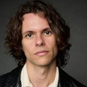 Julian De La Celle als Greg