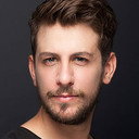 Birand Tunca als Emre Divit