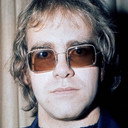 Elton John als Self (archive footage)
