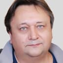 Александр Клюквин als Zharov, sports commentator