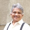 Ajit Kelkar als Lecturer