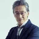 Masami Horiuchi als Reporter Ichiro Tamura