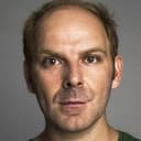 Νικόλας Χανακούλας als Troika Functionary