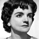 Bélgica Castro als María's godmother