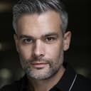 John Anderson als Nolan