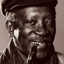 Ousmane Sembène als The Teacher (uncredited)