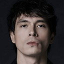 Jake Cuenca als T.J.