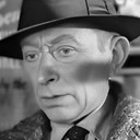 Jacques Cey als Man in Bus Queue (uncredited)