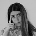 María R. Arias, Assistant Director