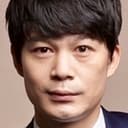 Han Chul-woo als Detective Kim