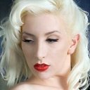 Miss Mia Vixen als Background Dominaxtrix
