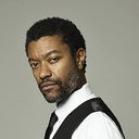 Rahad Coulter-Stevenson als New York Bar Patron (uncredited)
