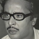 Dilip Mukherjee als Tarun Mukherjee