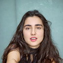 Hannah Abdoh als Amina