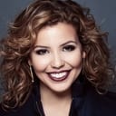 Justina Machado als Carmen Rodriguez - Lady Ticket Taker