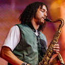 James Mollison als Self : Saxophone