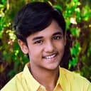 Aakash Santhosh als Cameo