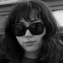 Ellie Mulkerron als Young Woman