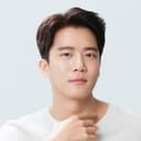 Ha Seok-jin als Kang Min-ho